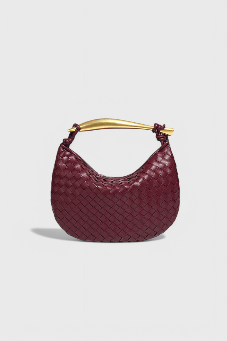 Bolso Gerda tejido con elegante asa dorada