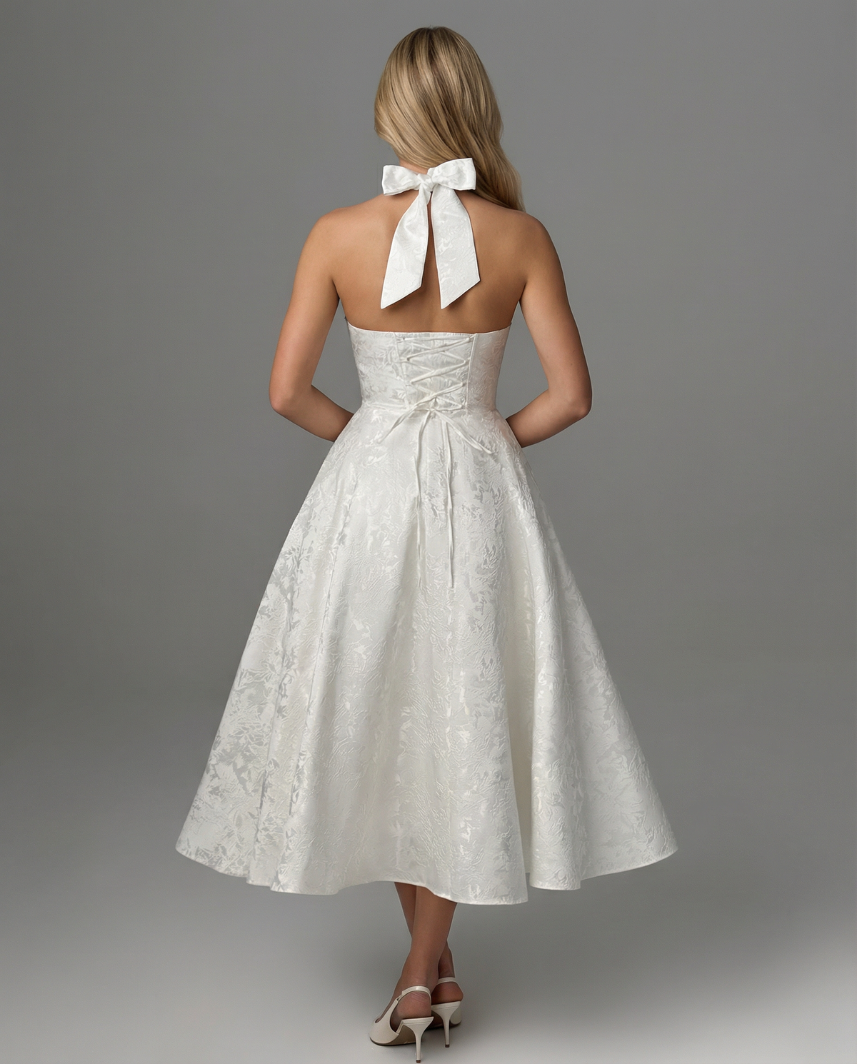 Sonia • Elegante vestido midi de jacquard con cuello halter