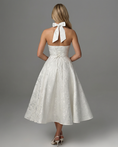 Sonia • Elegante vestido midi de jacquard con cuello halter