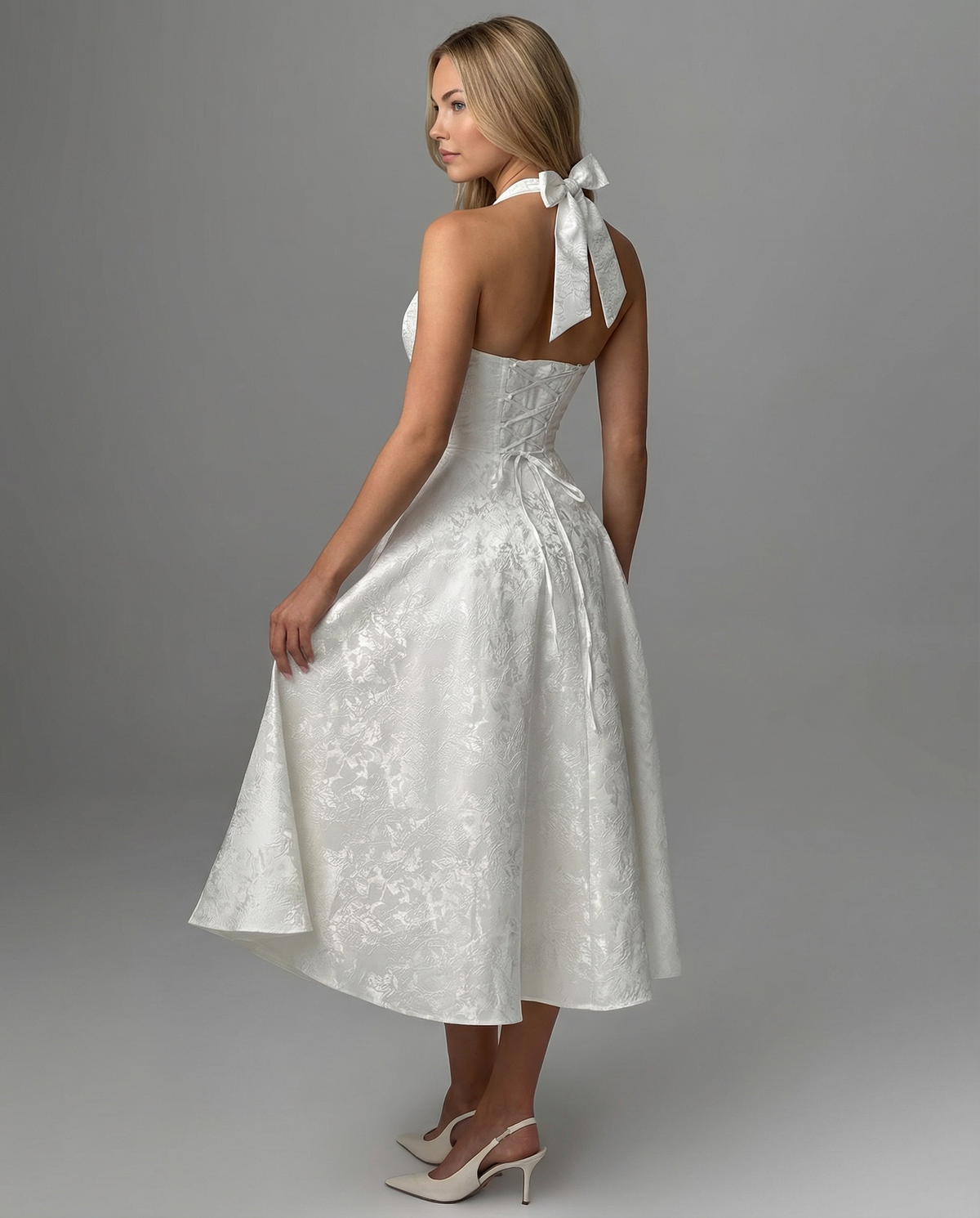 Sonia • Elegante vestido midi de jacquard con cuello halter