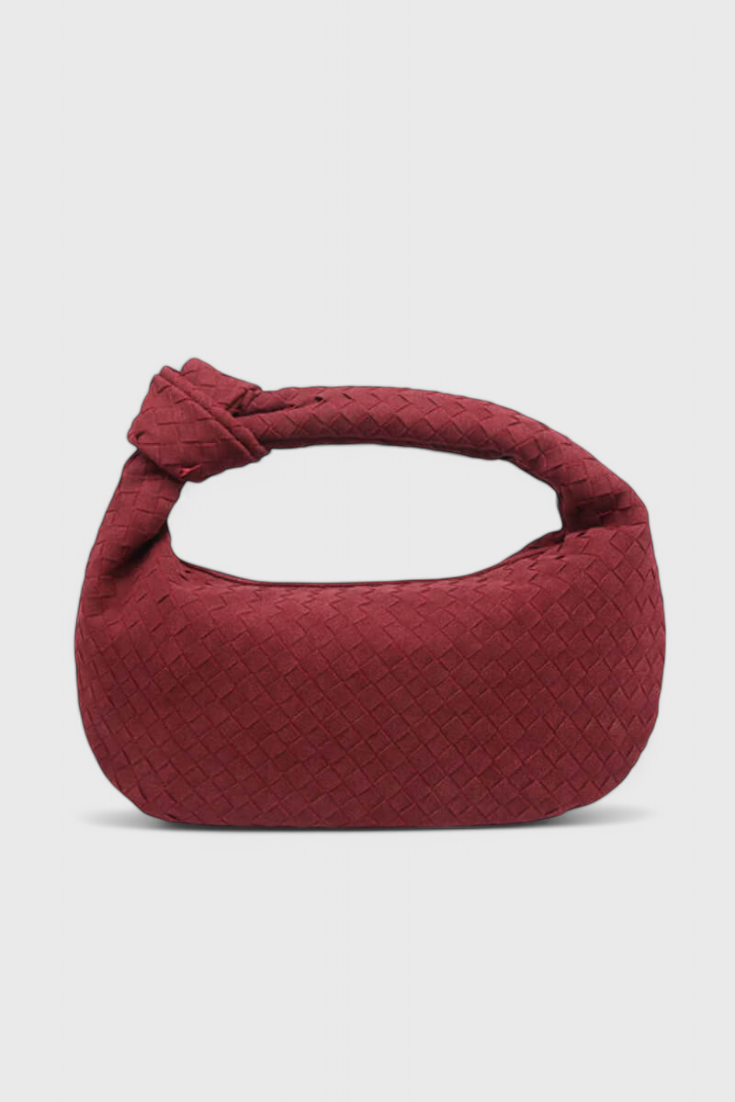 Bolso mediano tejido en lila con elegante detalle de nudo