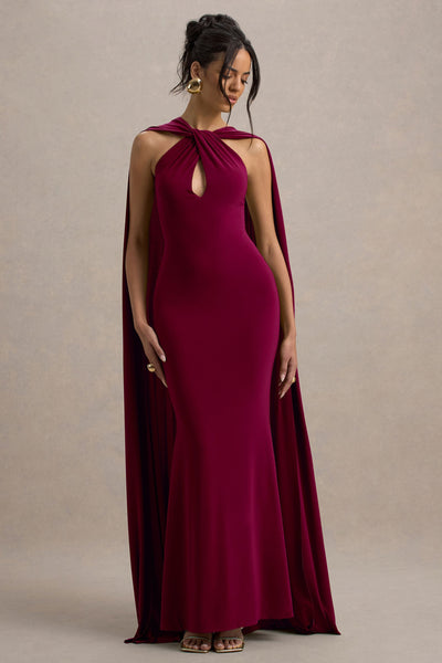 Rhoda | Vestido largo en burdeos con escote halter torcido y capa